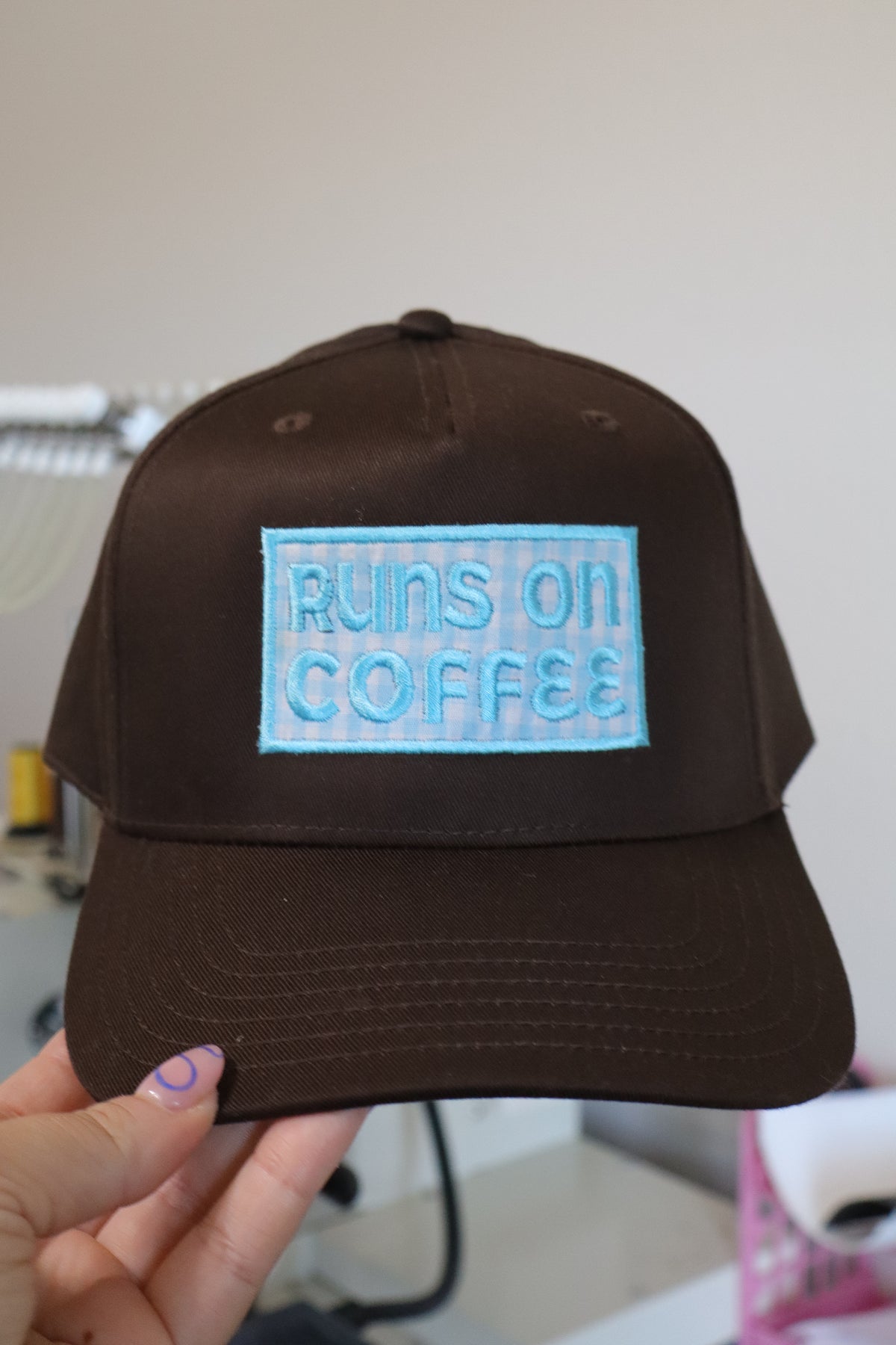 Runs On Coffee Brown trucker hat