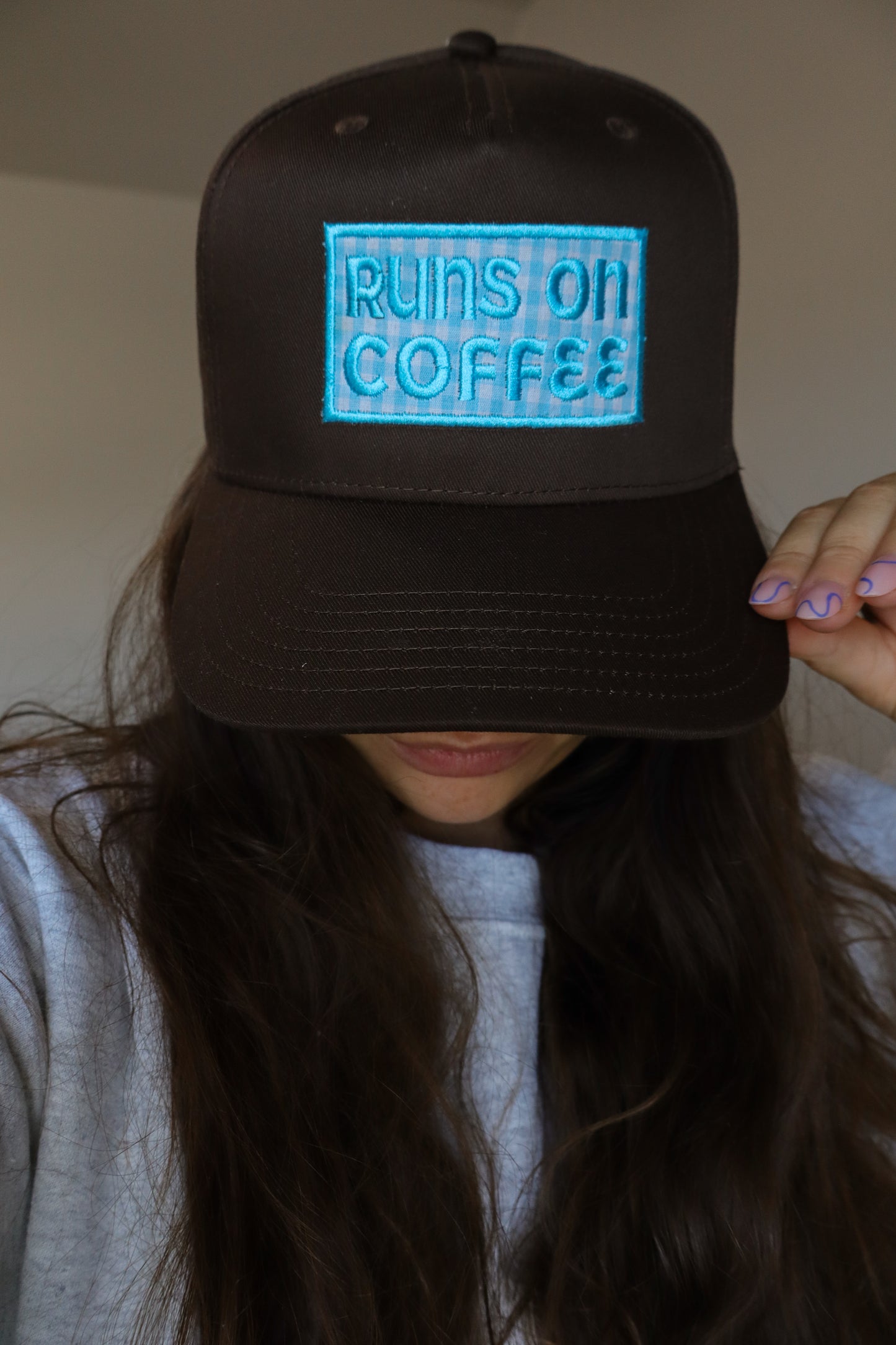 Runs On Coffee Brown trucker hat